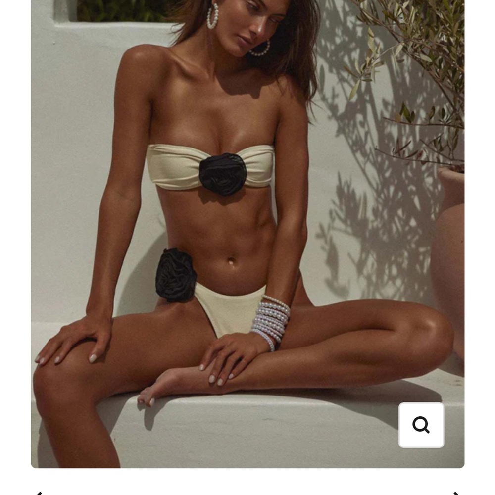 Cream bikini set with black roses.